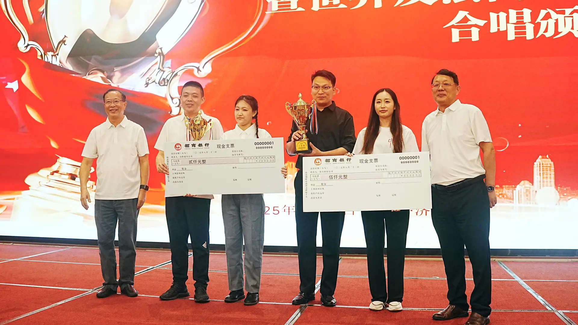 XTlaser Group photo at a celebration event 4